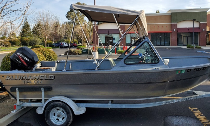 Side view of custom Bimini Top designed and manufactured by James Boat and Fiberglass Repair, Dixon, CA